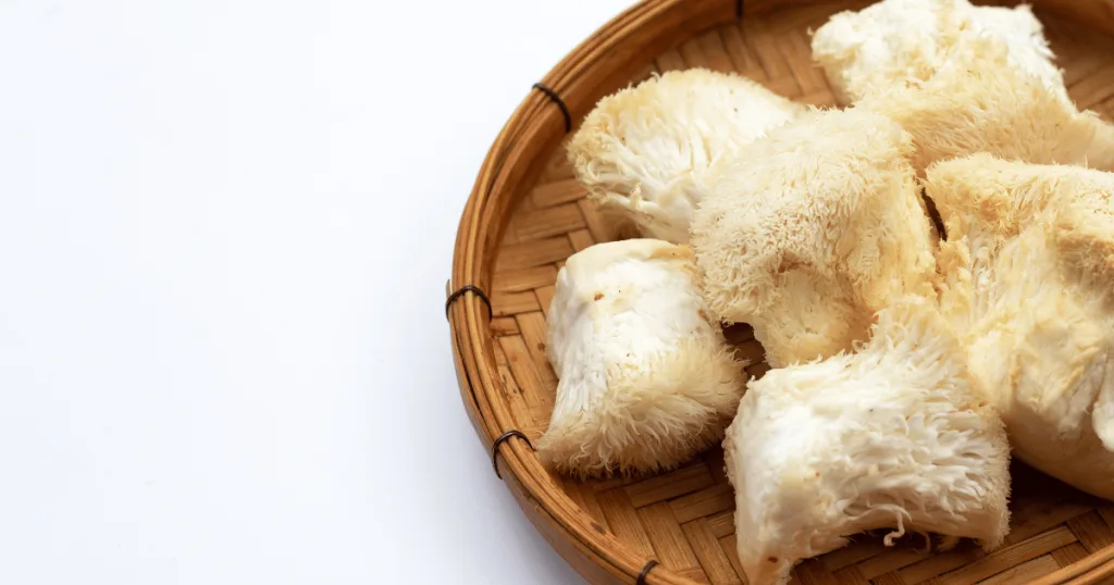 A wicker basket with chunks of white lion's mane mushroom.